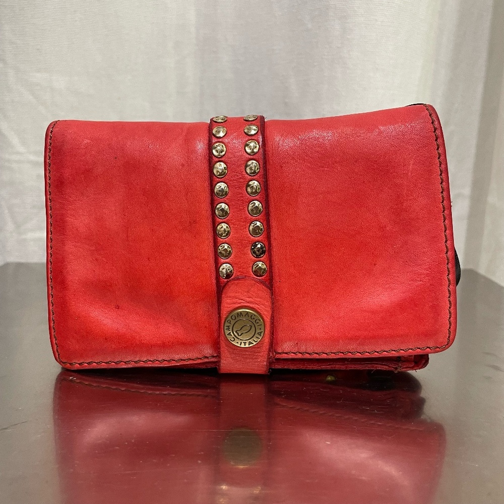 Red leather Campomaggi wallet with studs